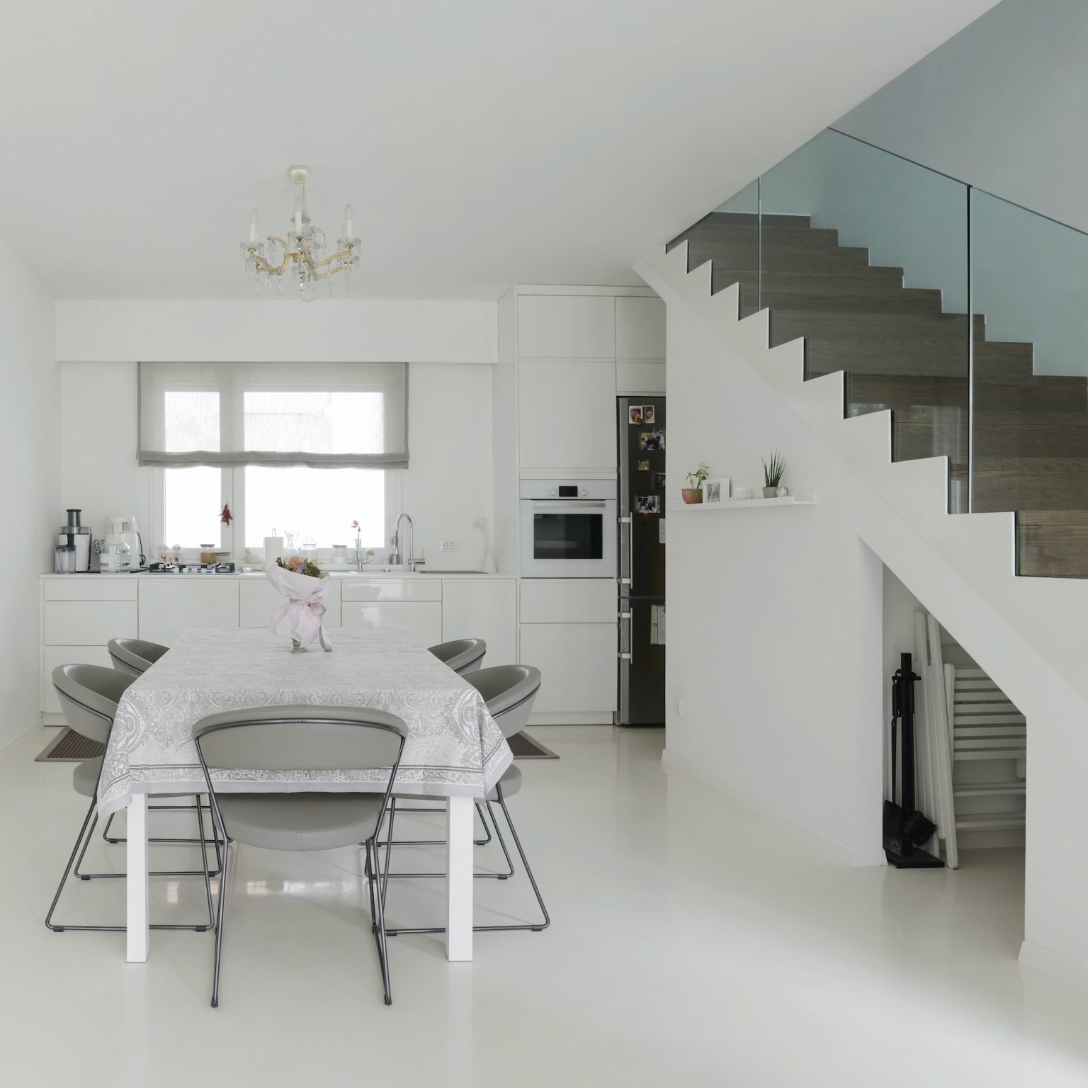 basement with glass balustrades to staircase