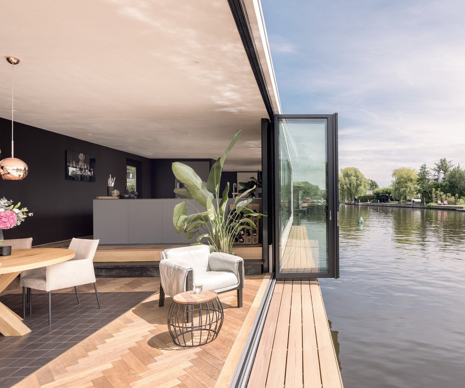 bifolding doors by a lake