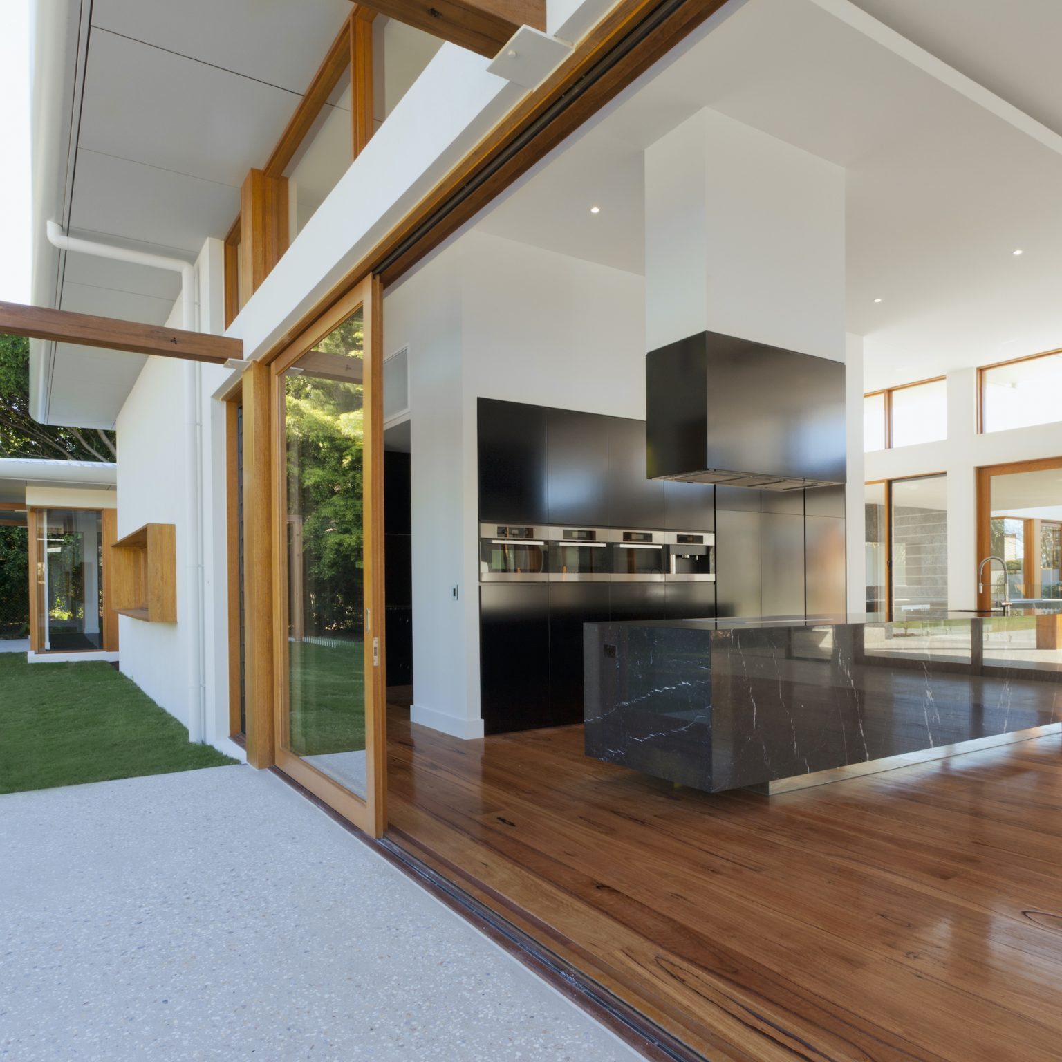 timber sliding doors open on patio