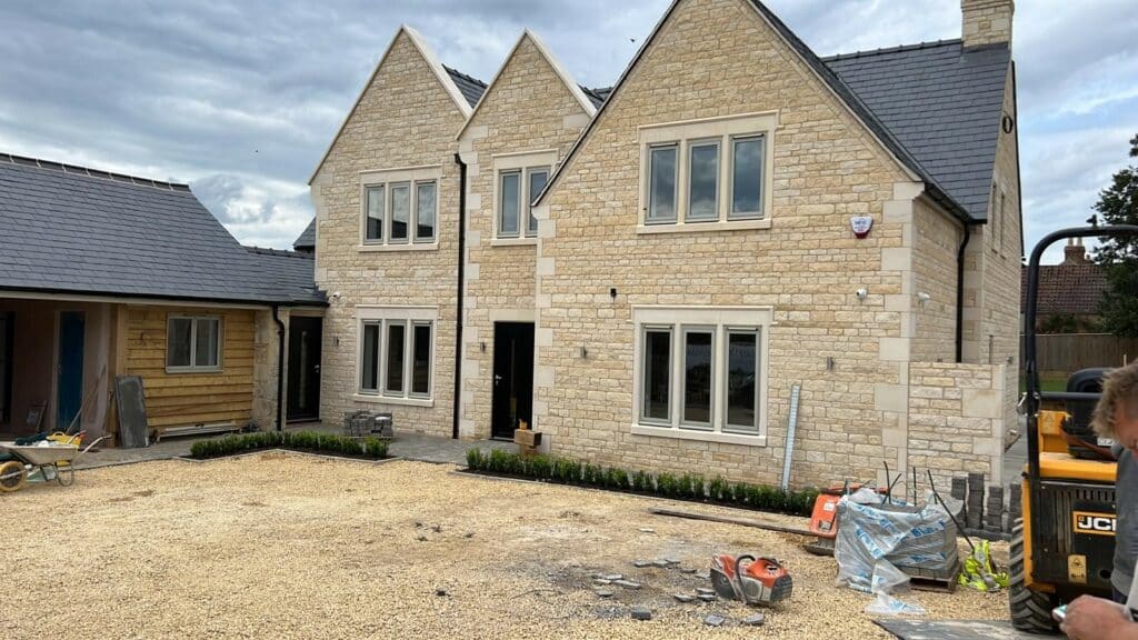 air mod aluminium windows in rutland house in a stone grey finish