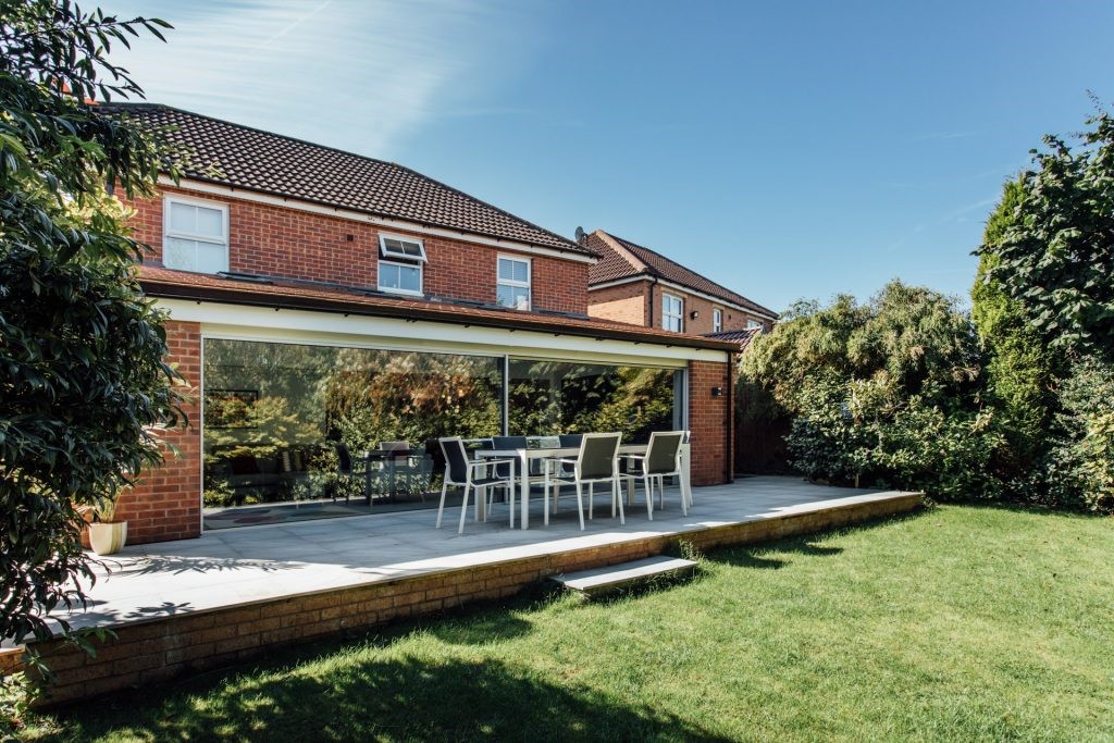 Cortizo sliding doors in a new extension, two large glass panels