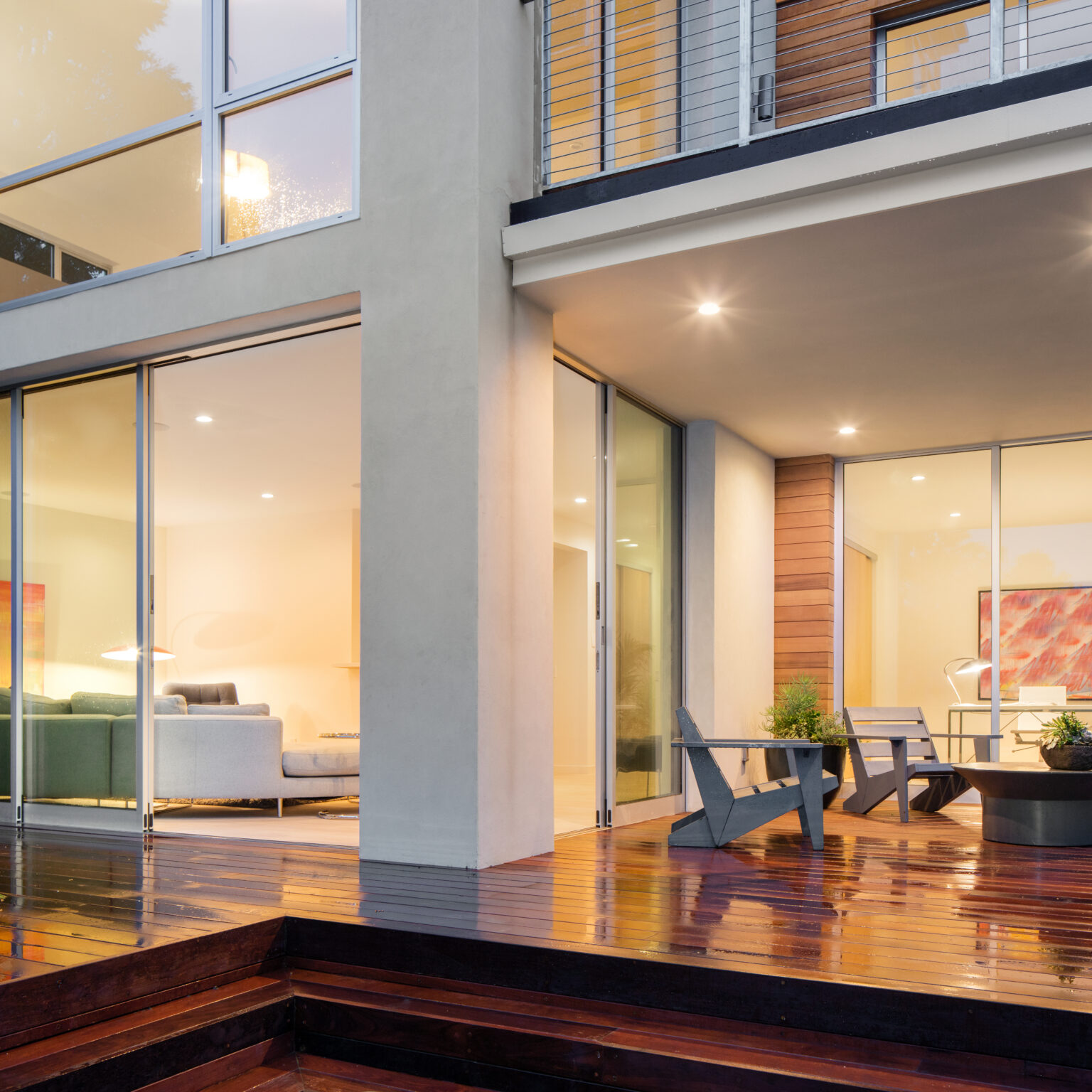 ultra slim sliding doors on a wet patio with decking