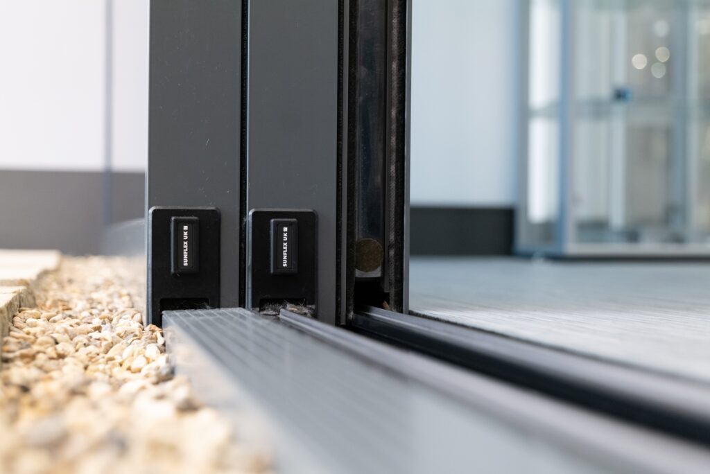 Close up picture of Sunflex sliding doors flush stacking