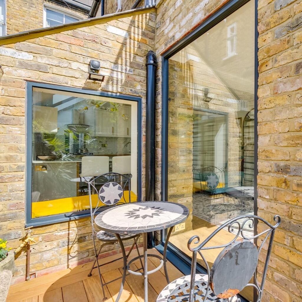 cortizo cor 70 hidden sash window
in brick house