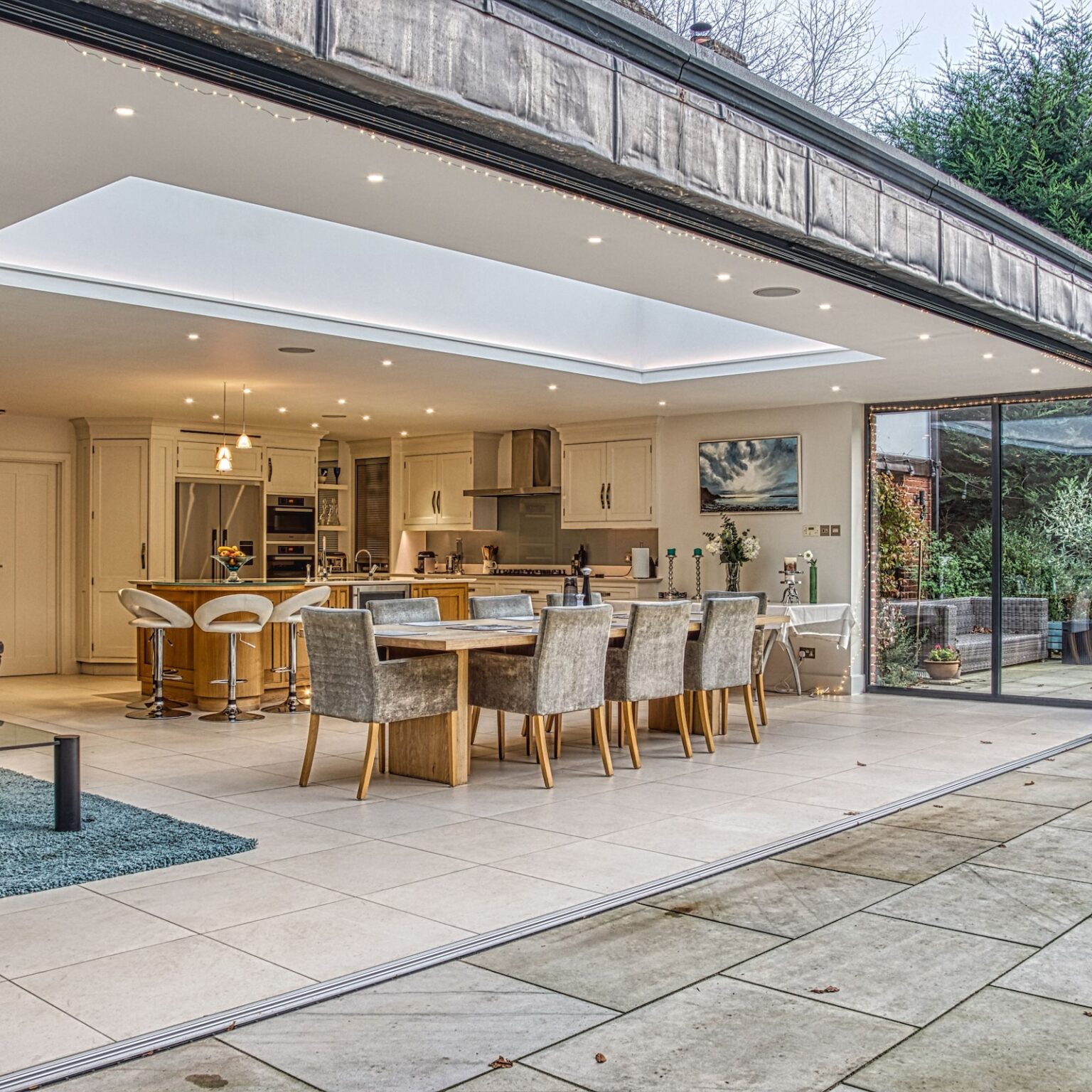 sunflex sf75eco bifold in a kitchen extension leading to patio area